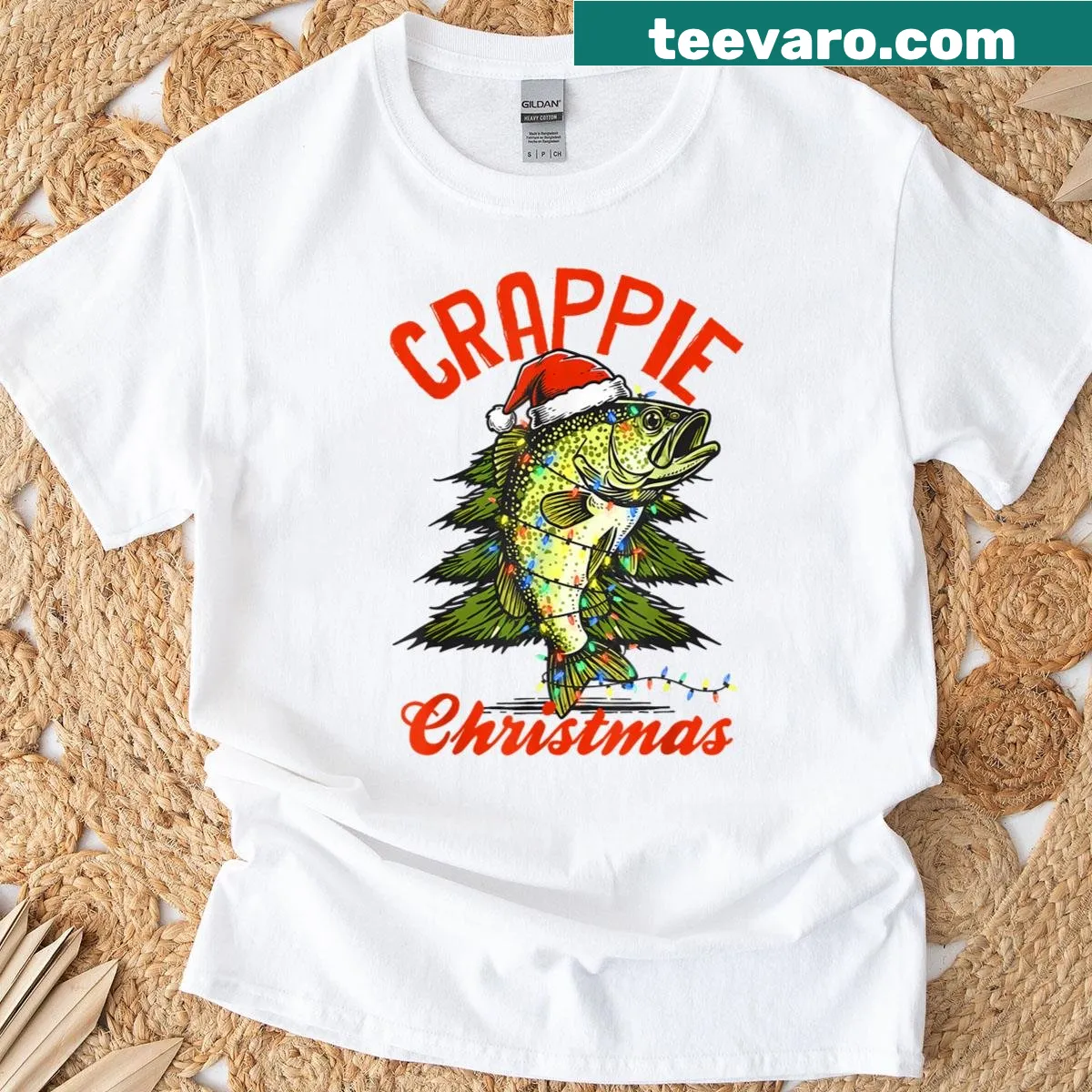 Santa holding crappie fish illustration for a festive T-shirt — on a men's t-shirt