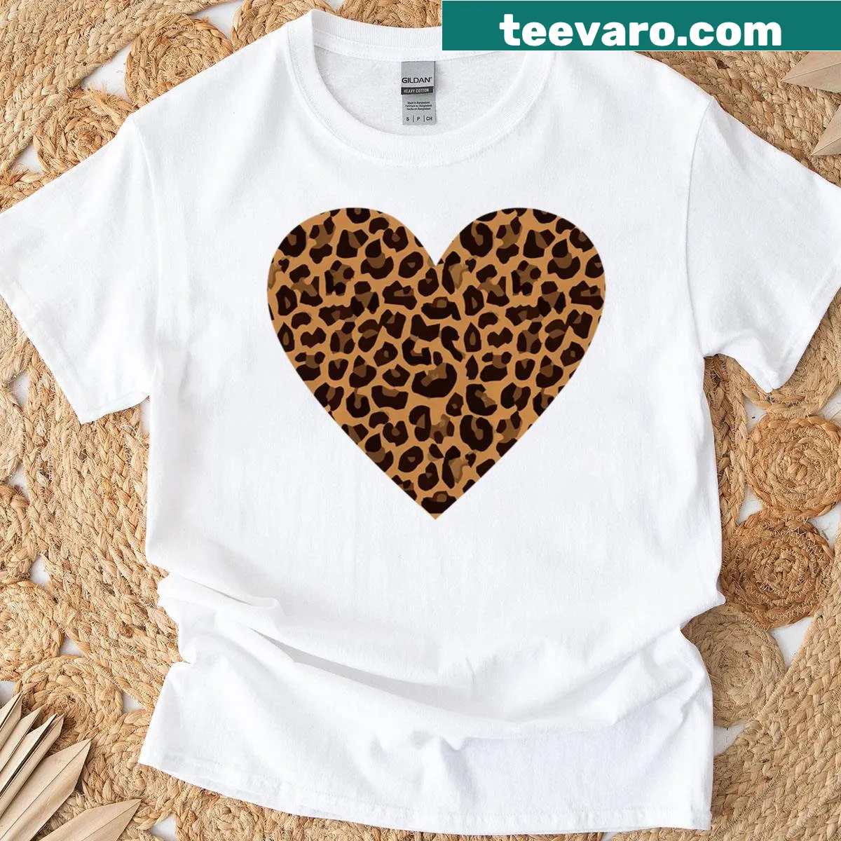 Heart made of cheetah and leopard prints on T-shirt — on a men's t-shirt
