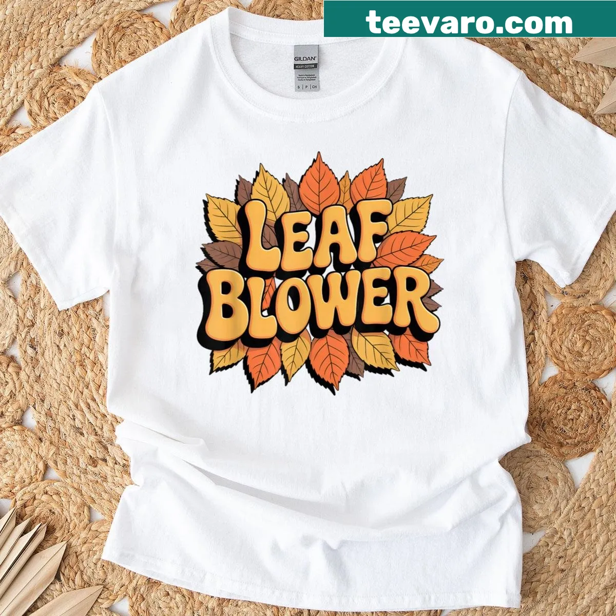 Illustration of a leaf blower amidst falling leaves on a T-shirt — on a men's t-shirt