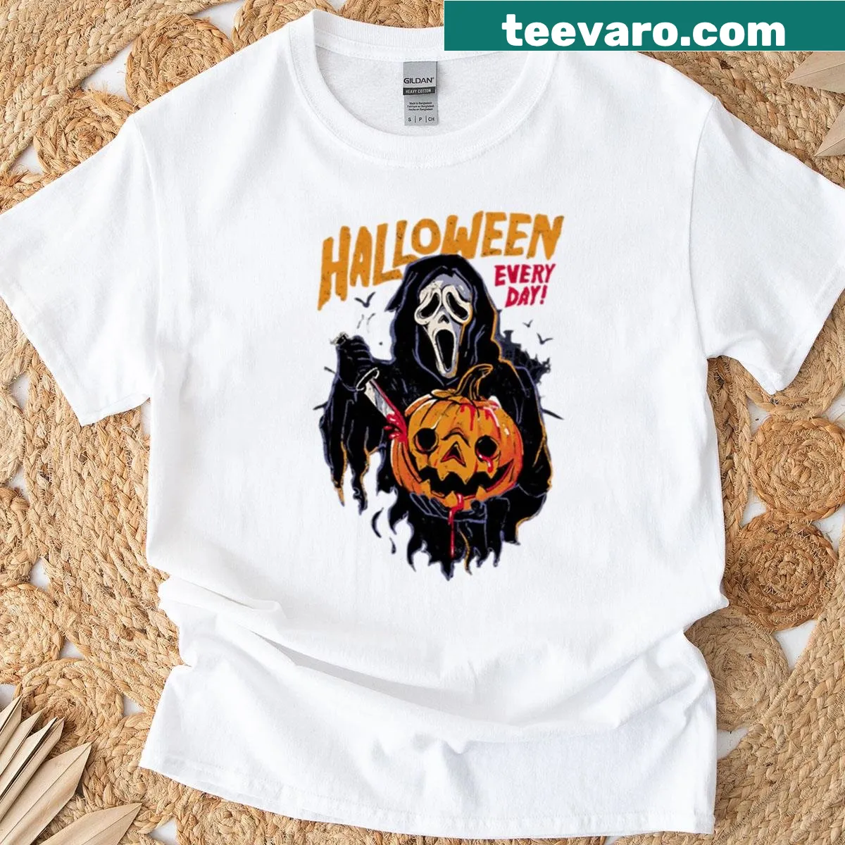 Ghostface and pumpkin graphic on a Halloween T-shirt — on a men's t-shirt