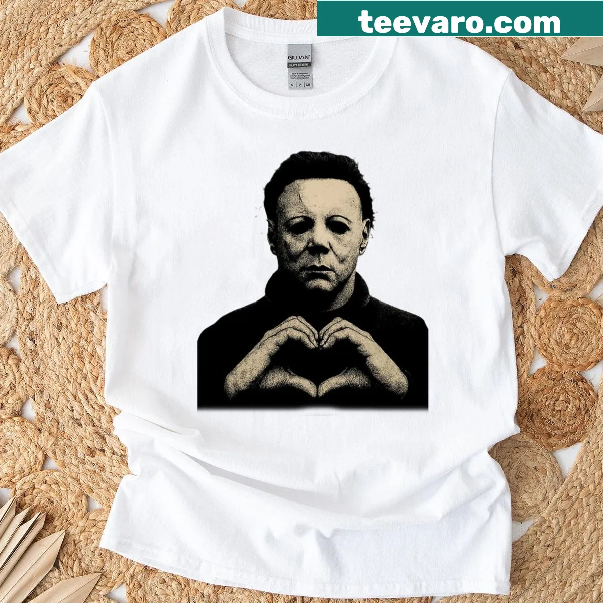 T-shirt with a heart hand graphic and Halloween horror elements — on a men's t-shirt