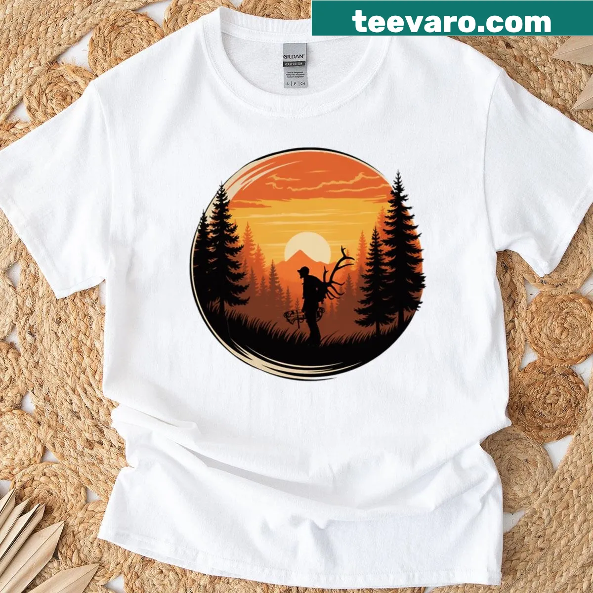 Illustrated t-shirt featuring a serene sunset scene for hunters. — on a men's t-shirt