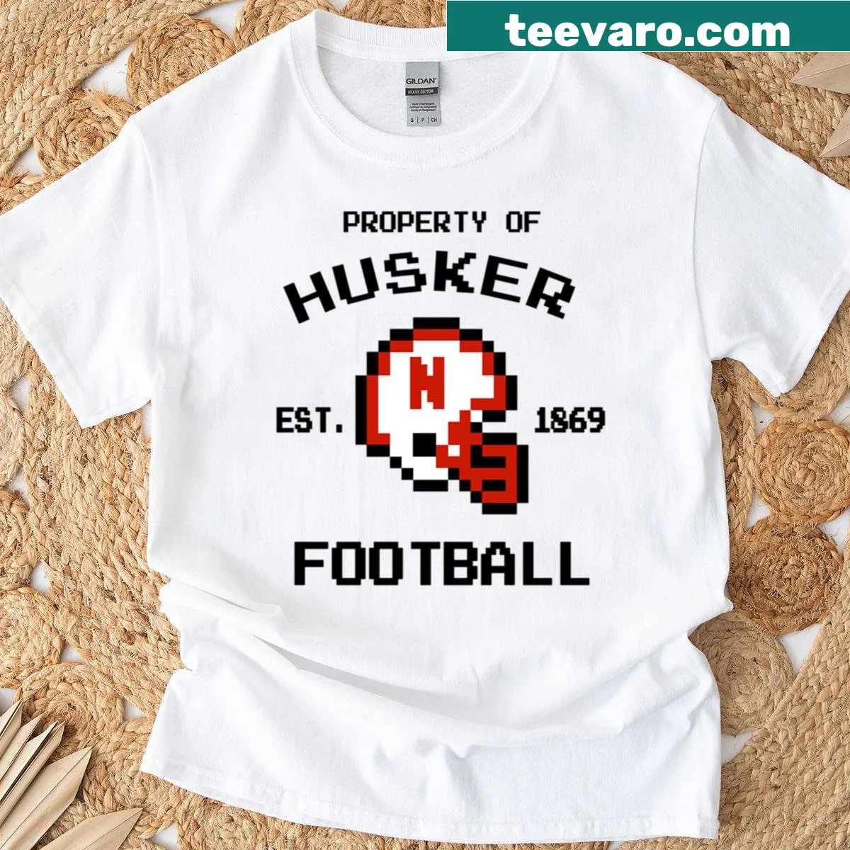 T-shirt with 'Nebraska - Property Of' helmet design — on a men's t-shirt