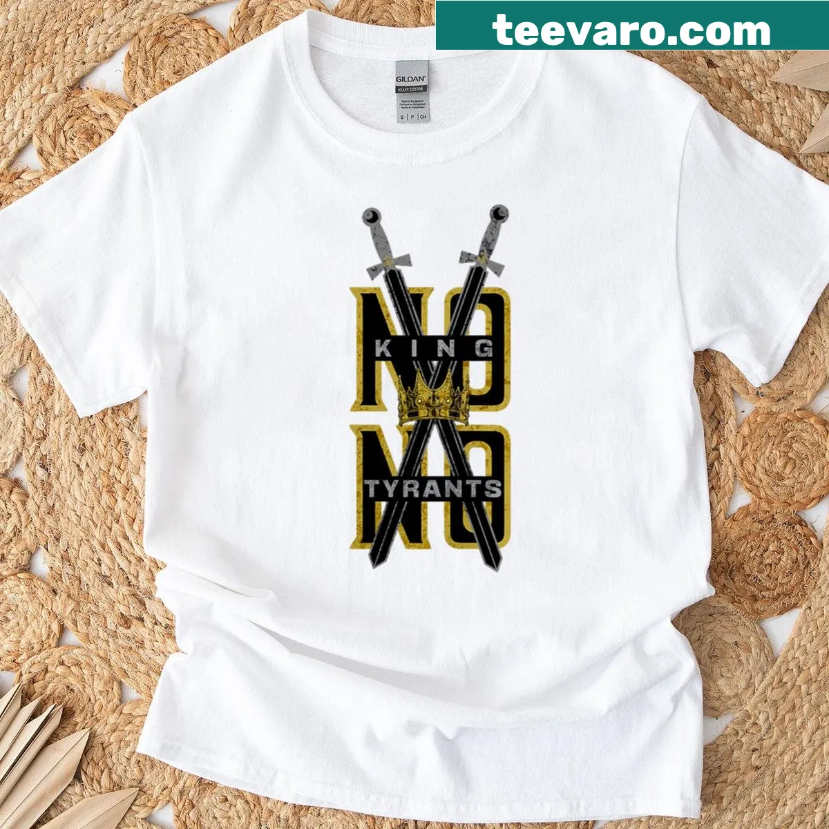 Bold T-shirt with the phrase 'No King No Tyrants' in strong typography. — on a men's t-shirt
