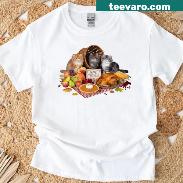 Vintage-style t-shirt with Persian kittens amidst fall harvest graphics.