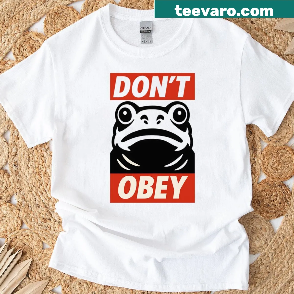 Street art-inspired T-shirt featuring a frog with 'Don’t Obey' text — on a men's t-shirt
