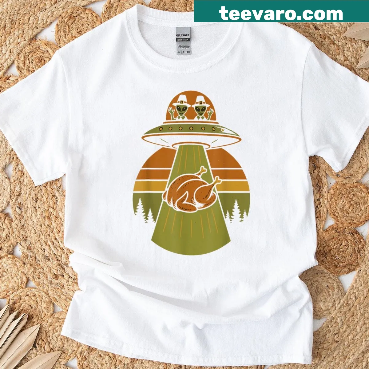 Humorous Thanksgiving t-shirt with alien turkey abduction design — on a men's t-shirt