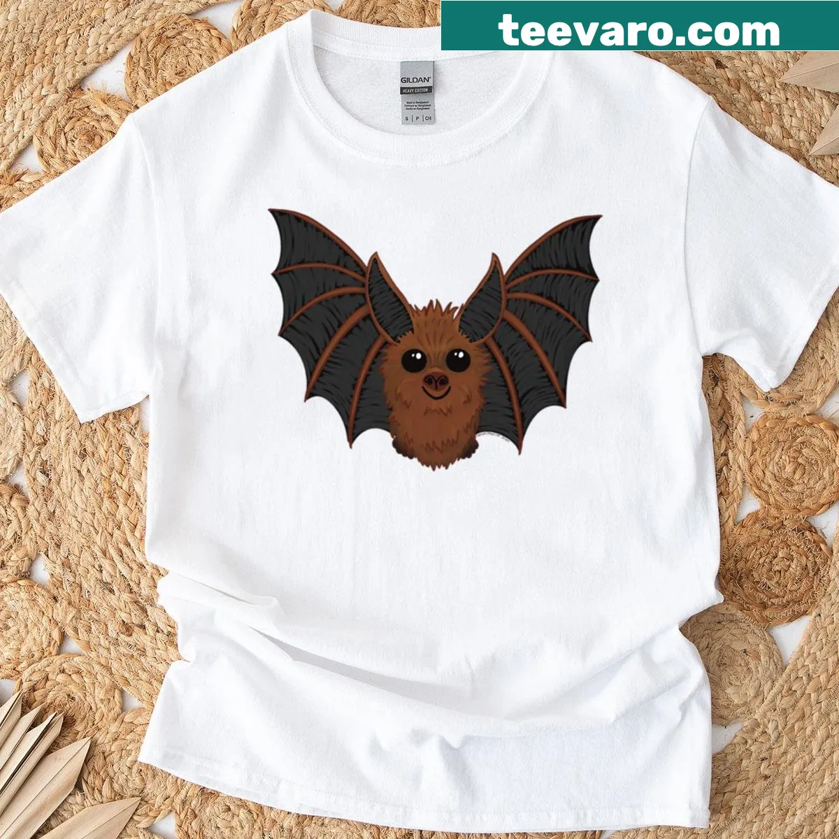 Illustrative t-shirt featuring a bat design — on a men's t-shirt