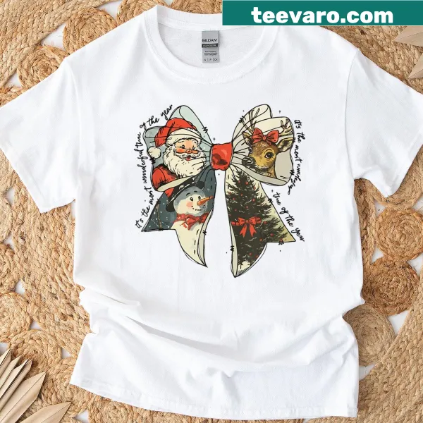 Vintage Christmas t-shirt with Santa, reindeer, and snowman motifs