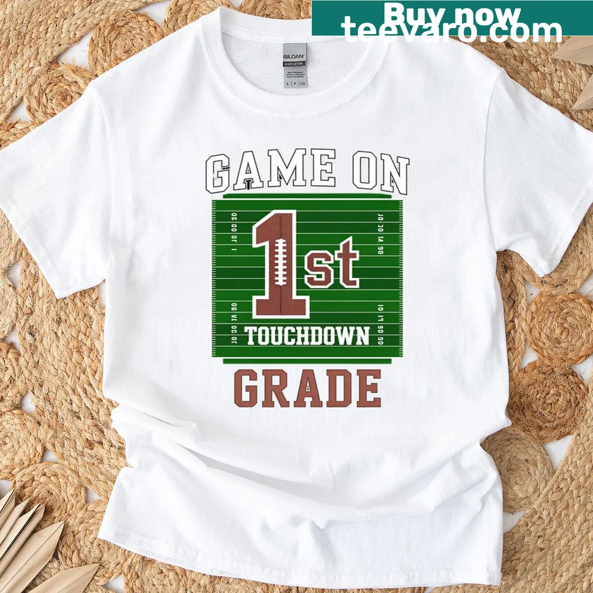 1st Grade Boys Football T-shirt with fun game graphics — on a men's t-shirt