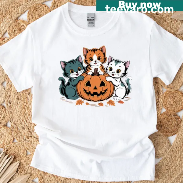 T-shirt with playful cats on pumpkins and Halloween icons