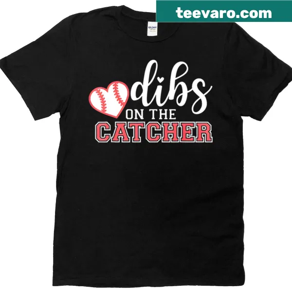 Playful t-shirt with the phrase 'Dibs On My Catcher Heart' for baseball lovers.