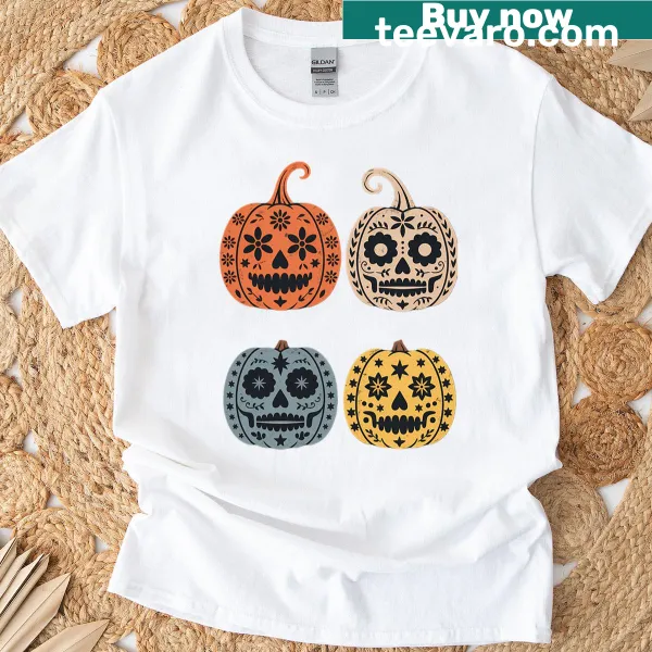 Pumpkin graphic with elements from Halloween and Día de los Muertos