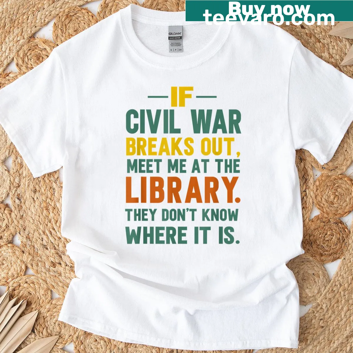 Humorous T-shirt with text about meeting at the library — on a men's t-shirt