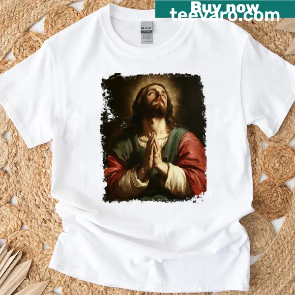 Artistic illustration shirt featuring prayerful hands and Jesus Christ message