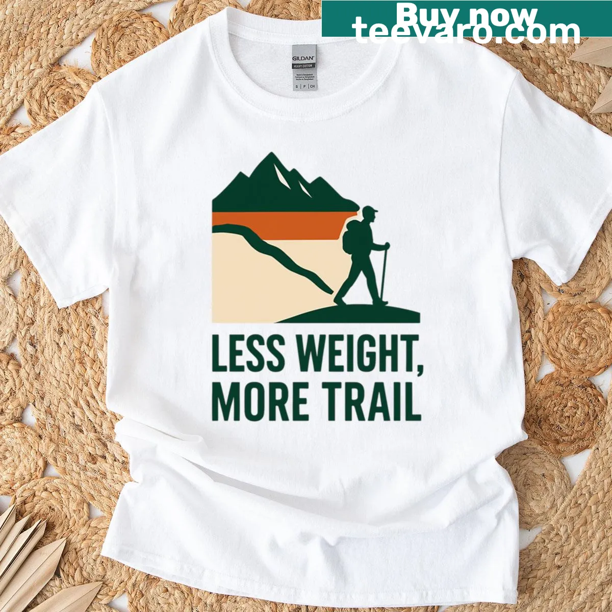 Ultralight backpacking t-shirt with 'Less Weight More Trail' text — on a men's t-shirt