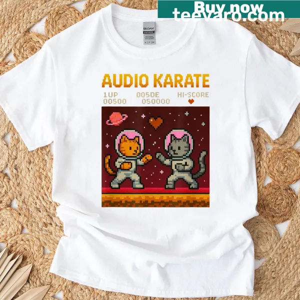Cartoon T-shirt featuring space cats in a gaming-themed design