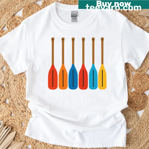 Vintage-style T-shirt featuring crossed oars against a water backdrop