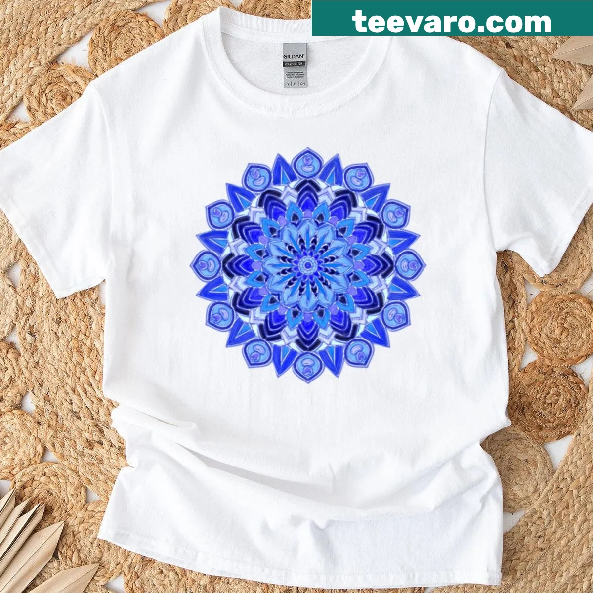 Intricate batik mandala graphic T-shirt design — on a men's t-shirt