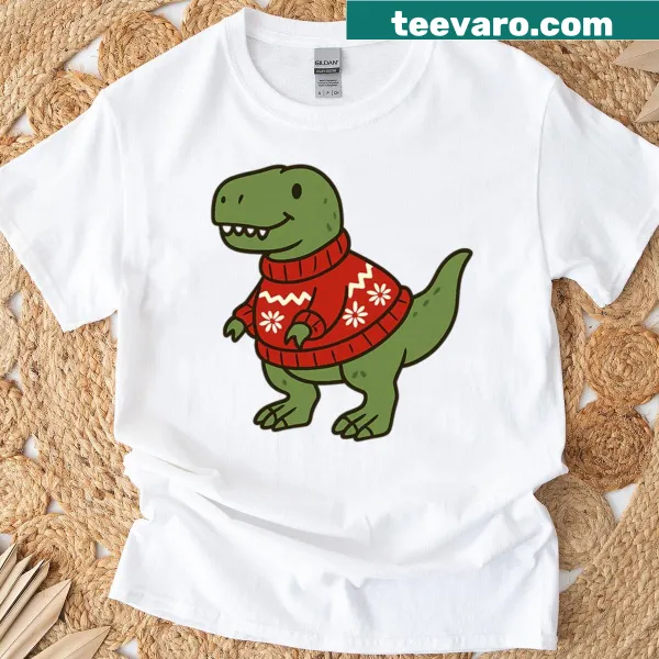 Cartoon dinosaur in festive attire on Christmas T-shirt.