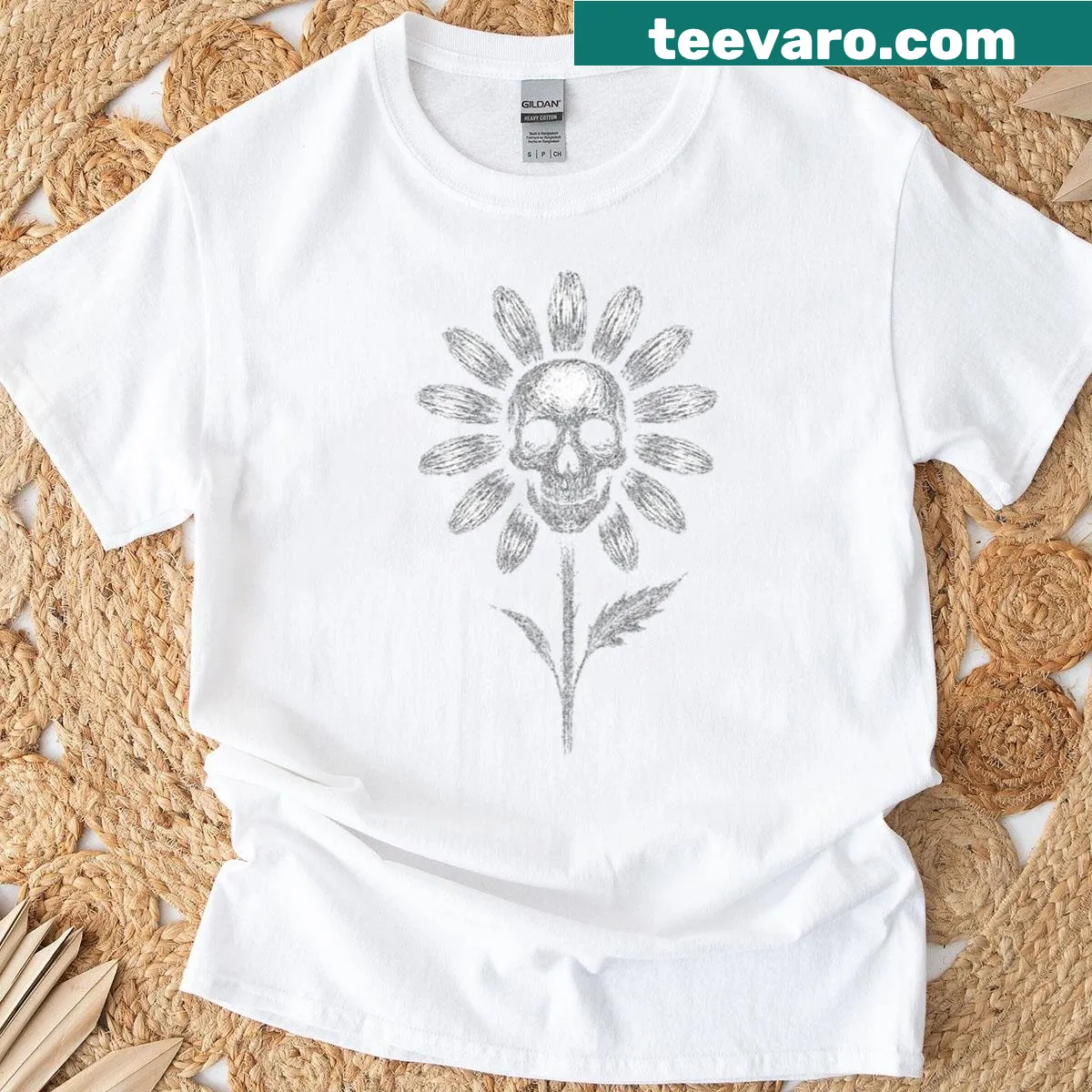 Gothic T-shirt featuring a skull and daisy floral design — on a men's t-shirt