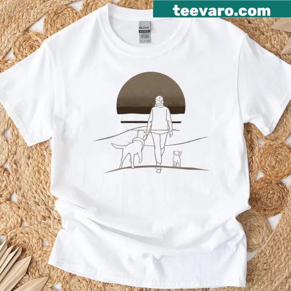 Illustrative sunset design with a person and dog walking on a t-shirt