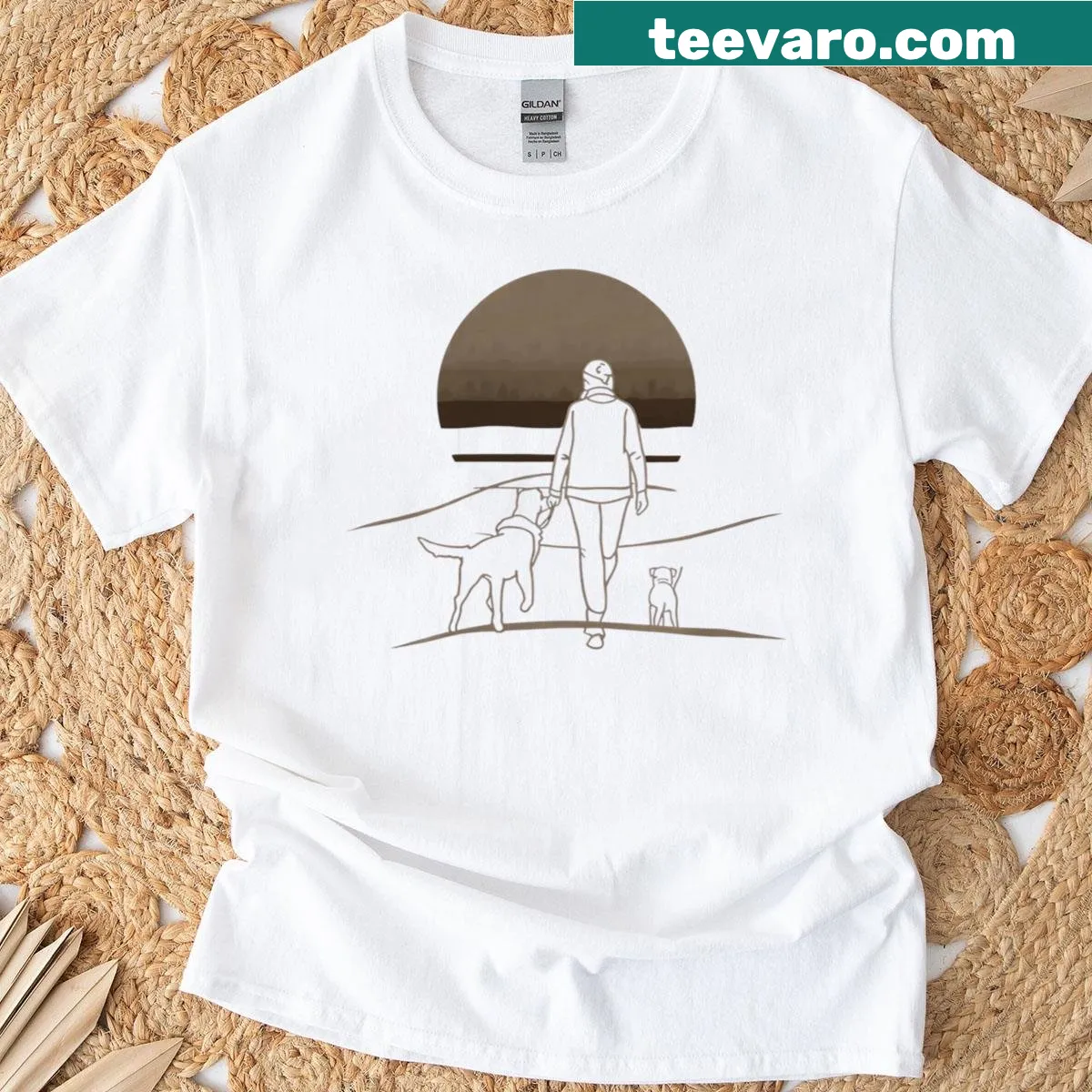 Illustrative sunset design with a person and dog walking on a t-shirt — on a men's t-shirt
