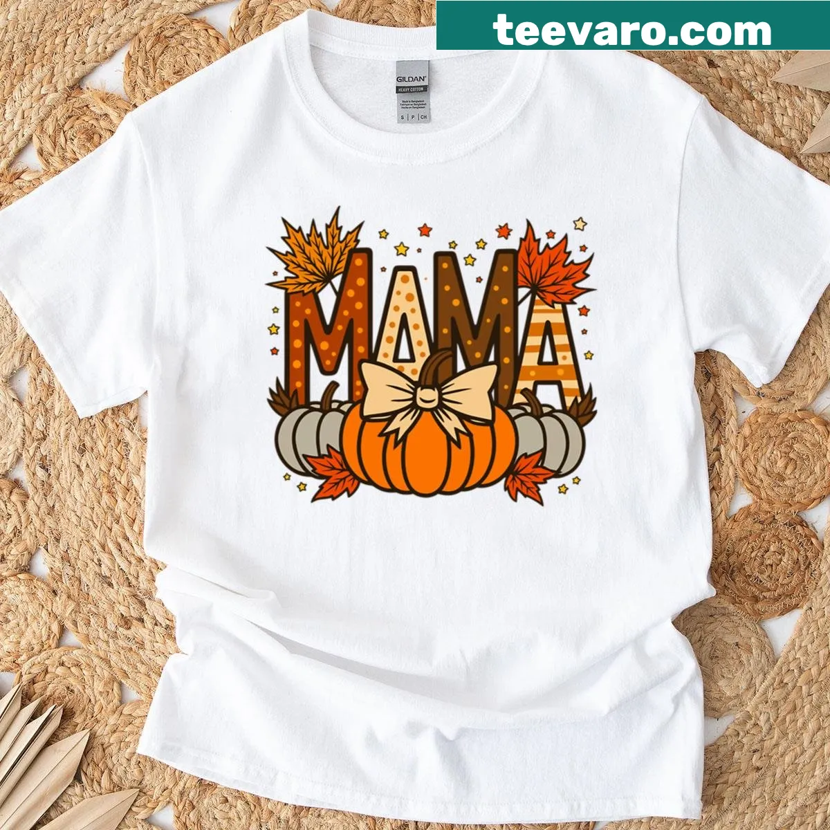 Autumn-themed Fall Mama t-shirt with pumpkin and leaves illustration — on a men's t-shirt