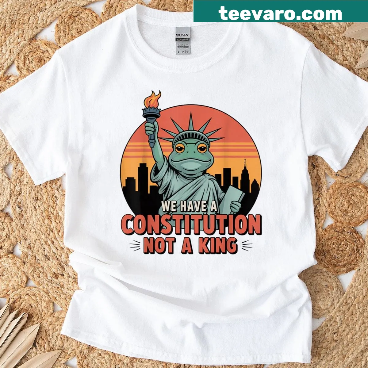 Humorous t-shirt featuring a frog Statue of Liberty graphic — on a men's t-shirt