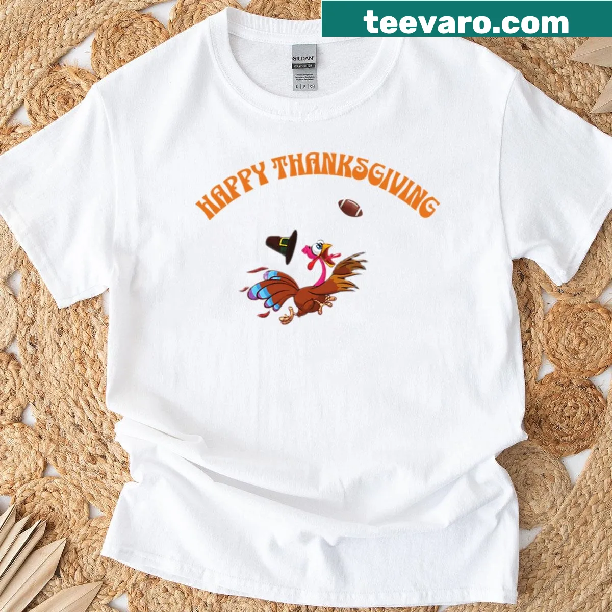 Thanksgiving shirt featuring a cartoon turkey playing football — on a men's t-shirt