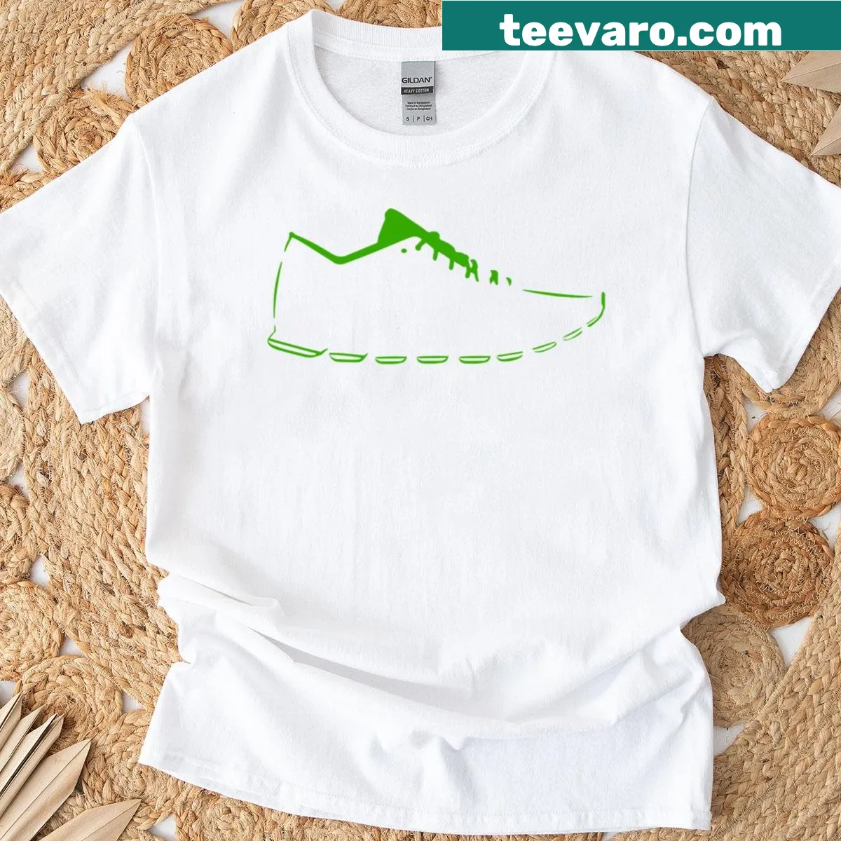 Minimalistic green sneaker illustration T-shirt design — on a men's t-shirt