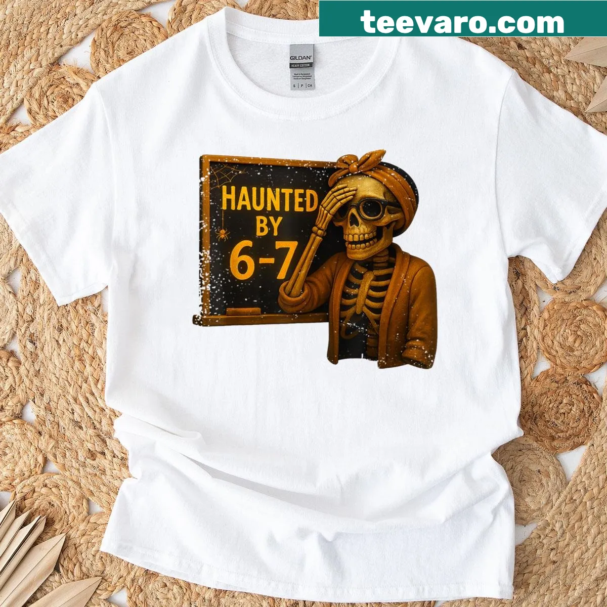 Funny teacher t-shirt with a skeleton and 'Haunted By 6-7' text — on a men's t-shirt