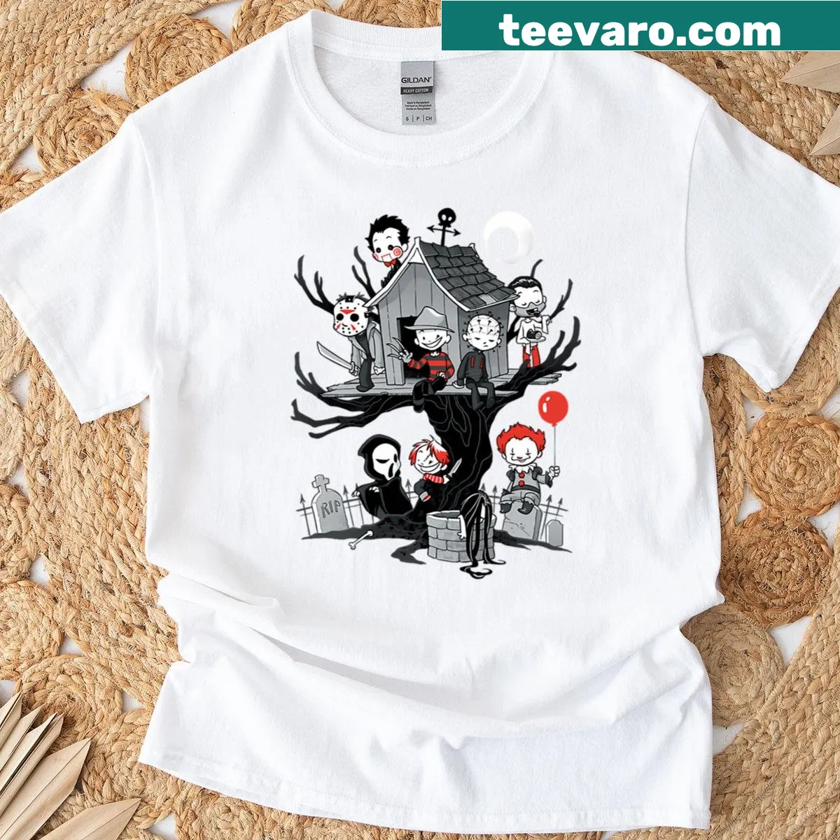 Graphic T-shirt featuring a haunted house illustration — on a men's t-shirt