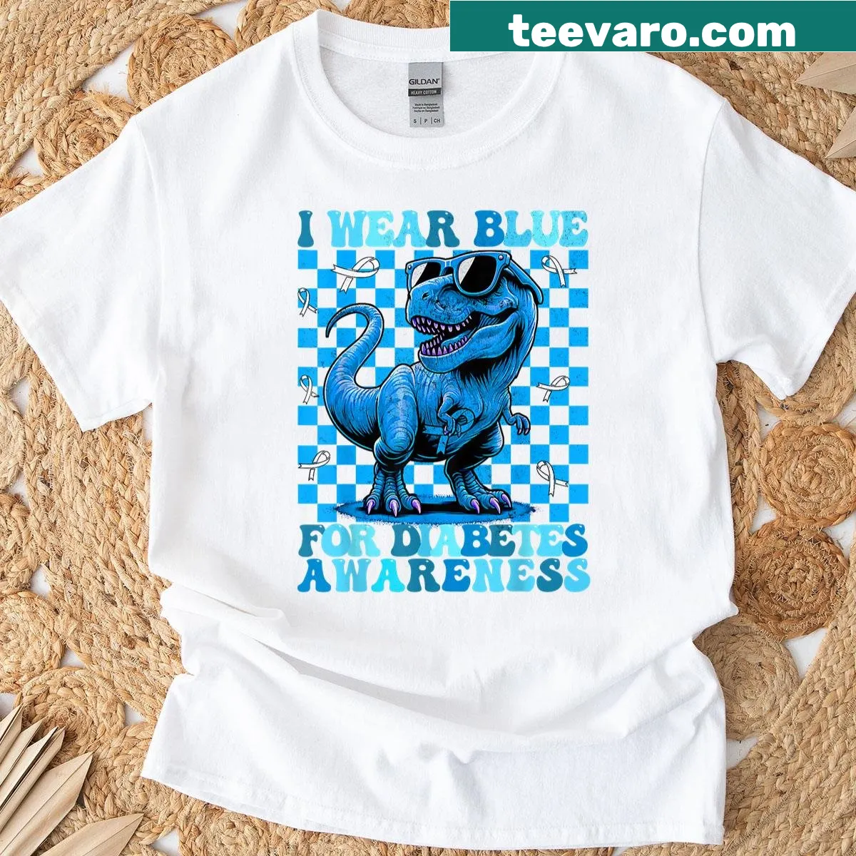 Dinosaur design with text supporting diabetes awareness on a women's t-shirt — on a men's t-shirt