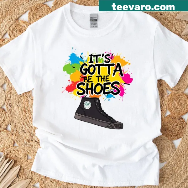 Graphic typography shirt celebrating shoes