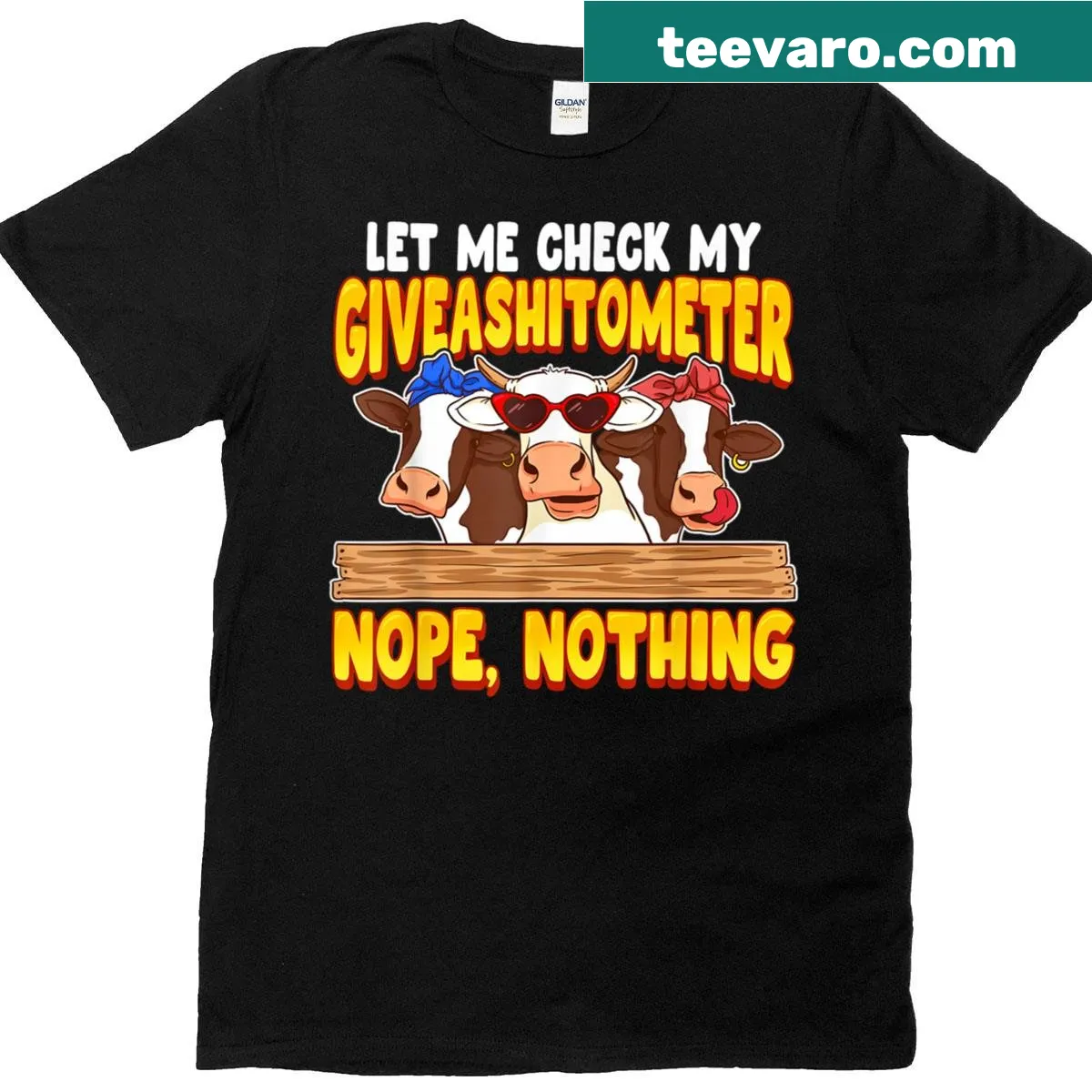 Humorous T-shirt with 'Let Me Check My Giveashitometer' and a cow graphic. — on a men's t-shirt