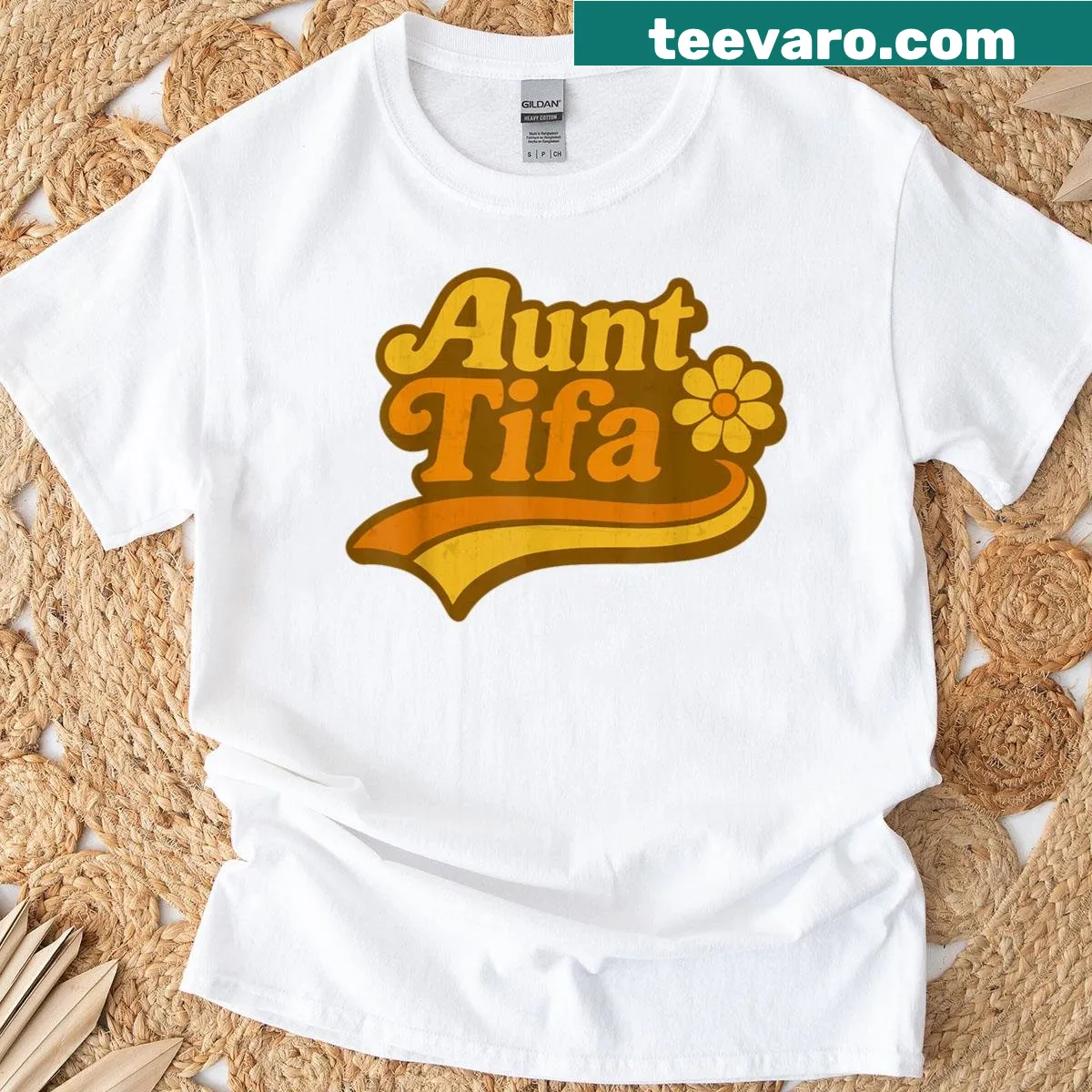 Vintage distressed T-shirt featuring retro flowers and 'Aunt Tifa' text — on a men's t-shirt