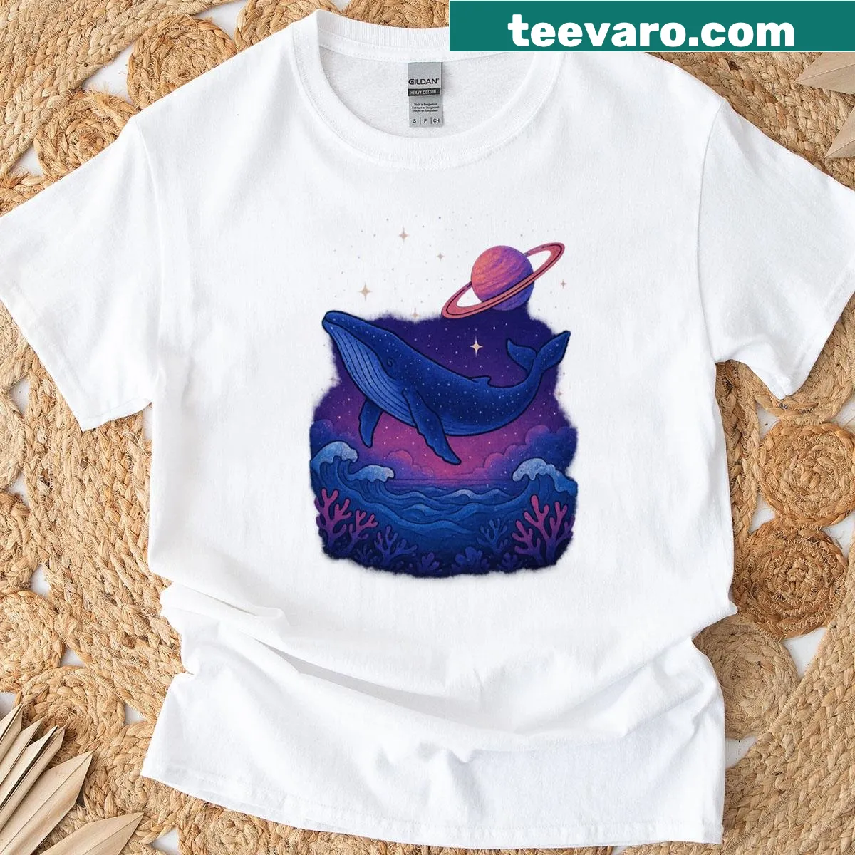 Cosmic ocean T-shirt featuring whales against a galaxy backdrop — on a men's t-shirt