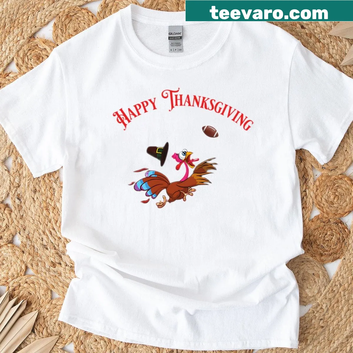 Funny Thanksgiving turkey playing football graphic on t-shirt — on a men's t-shirt