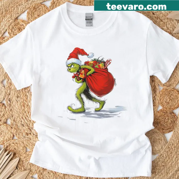 T-shirt with a humorous Grinch graphic stealing gifts