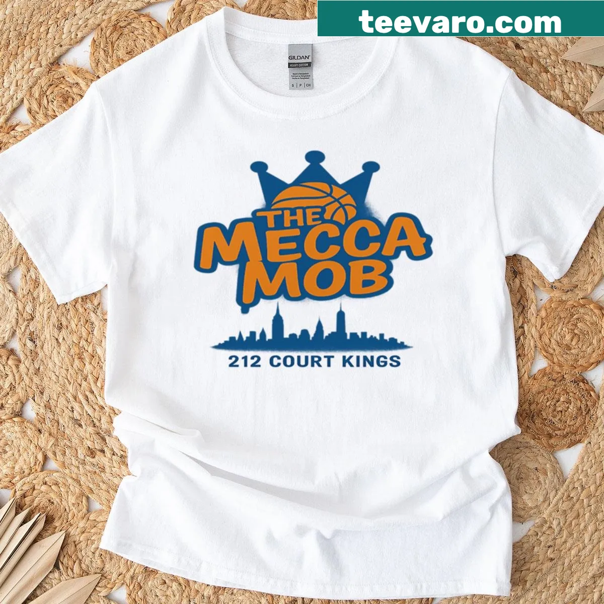 Illustrative graphic tee featuring the Mecca Mob logo and streetball elements. — on a men's t-shirt