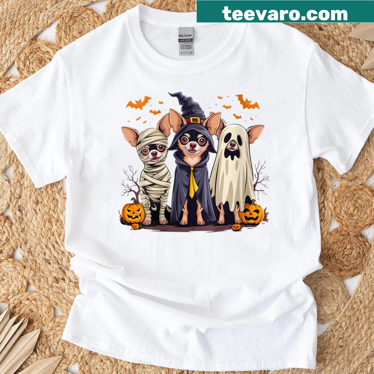 Chihuahua in a mummy costume with Halloween themes illustrated on a t-shirt. — on a men's t-shirt
