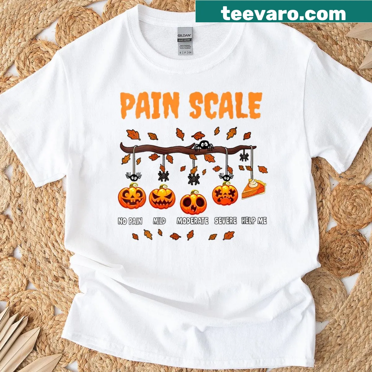 Humorous Halloween Pain Scale t-shirt with pumpkin design — on a men's t-shirt