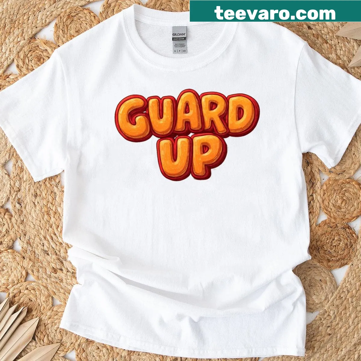 Logo T-shirt featuring 'Guard Up' phrase in a bold design — on a men's t-shirt