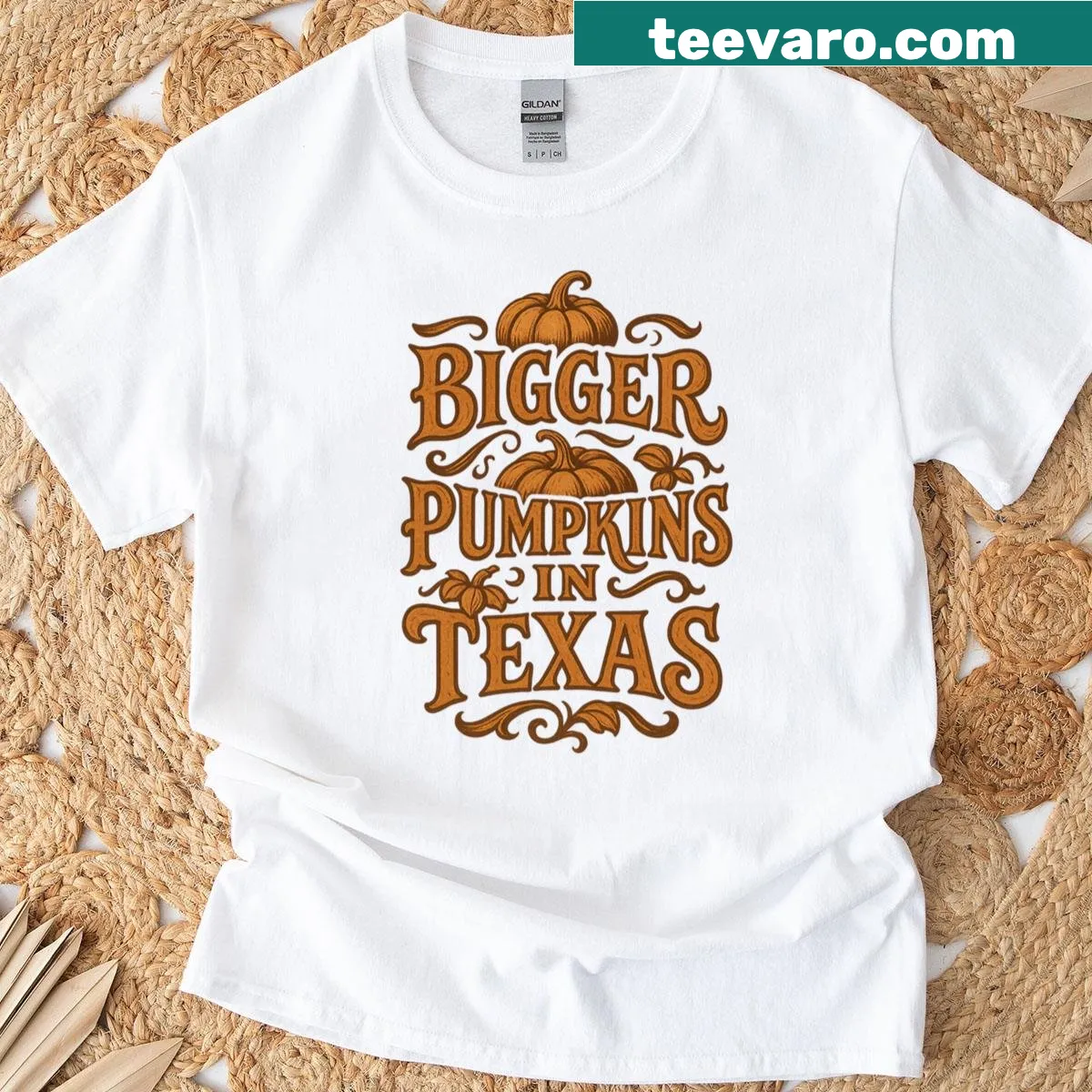 Funny shirt with the phrase Bigger Pumpkins In Texas in cowboy font — on a men's t-shirt