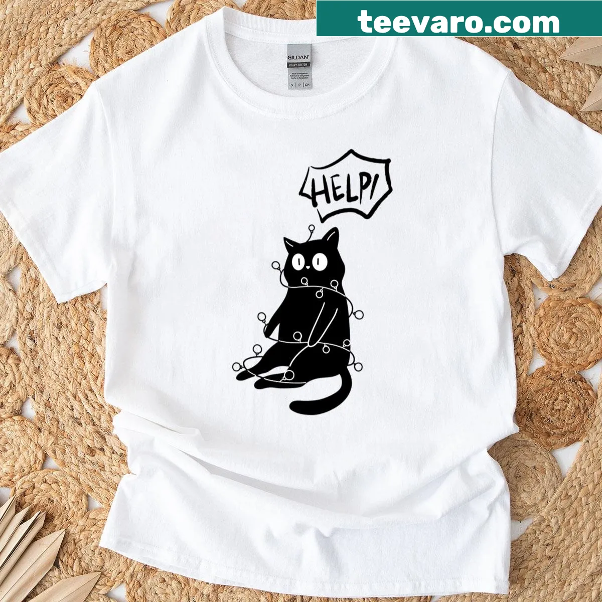 Black cat tangled in Christmas lights on T-shirt — on a men's t-shirt