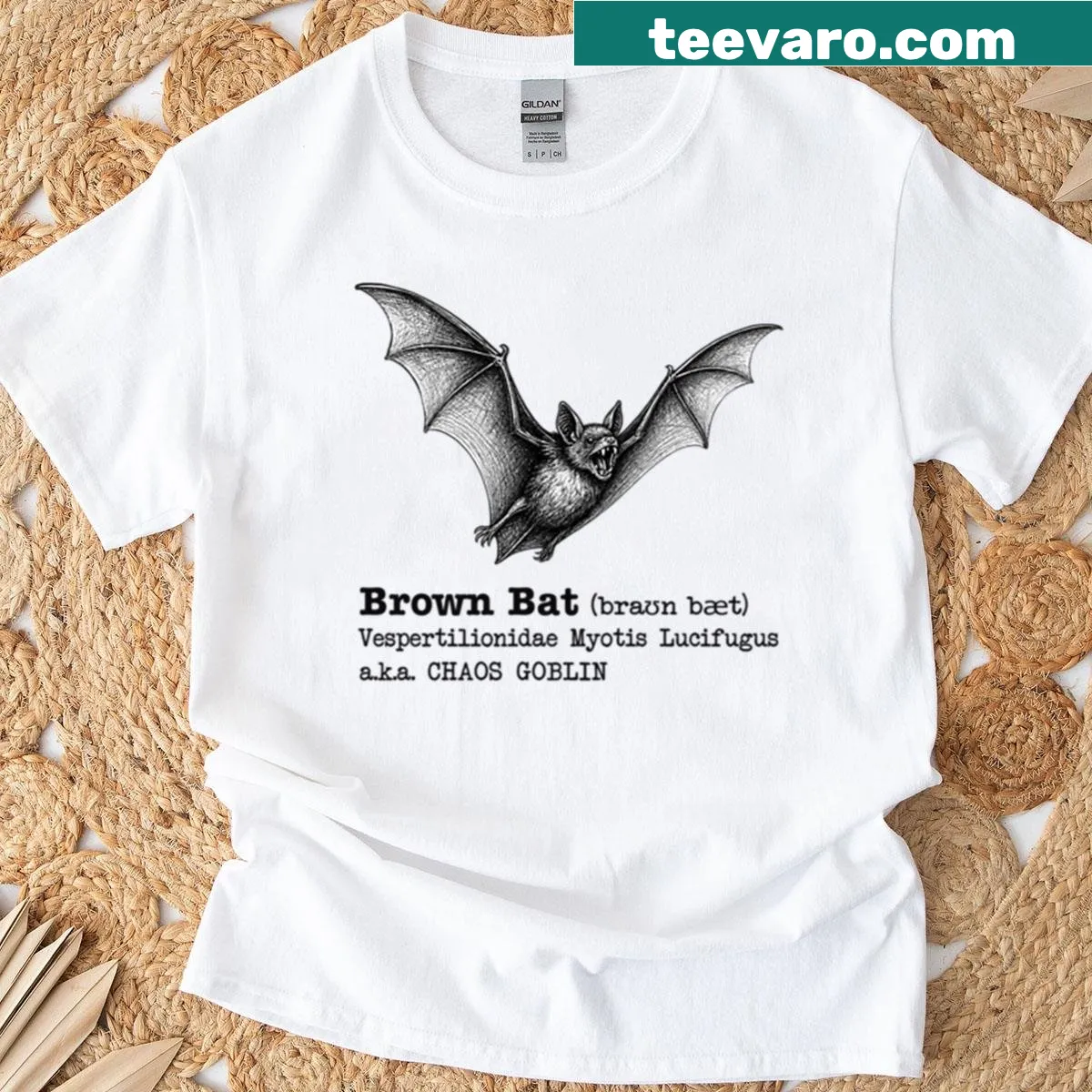 Playful T-shirt featuring a whimsical illustration of a brown bat as a chaos goblin — on a men's t-shirt