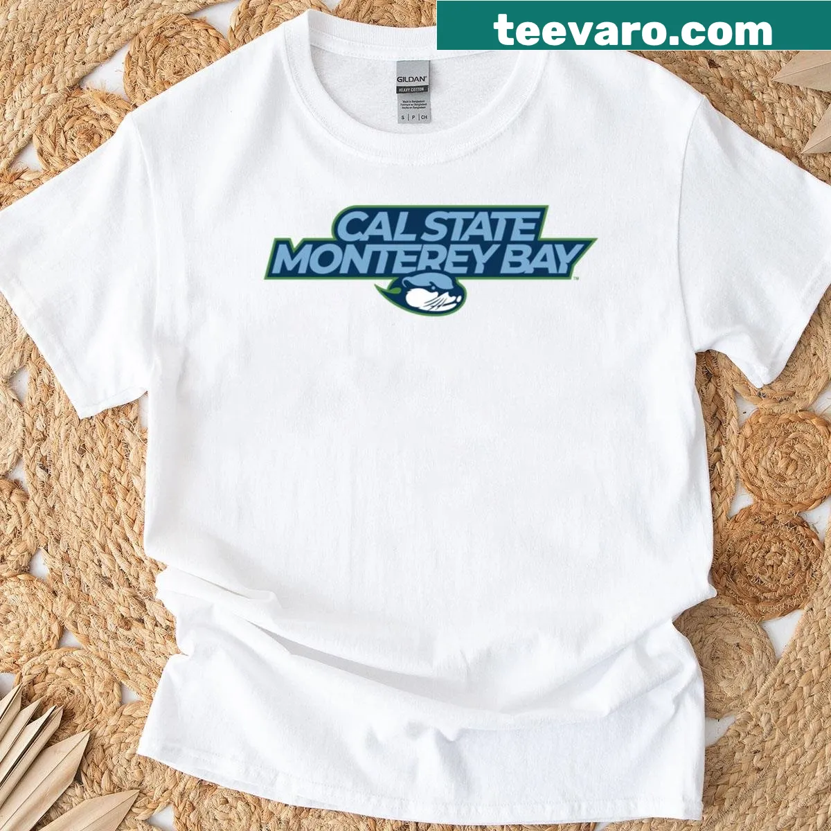 CSUMB Otters primary logo t-shirt celebrating university pride — on a men's t-shirt