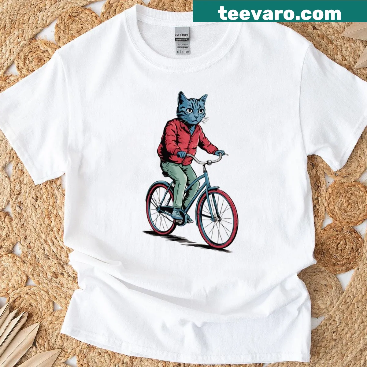 Funny retro illustration of a cat riding a bicycle on a T-shirt — on a men's t-shirt