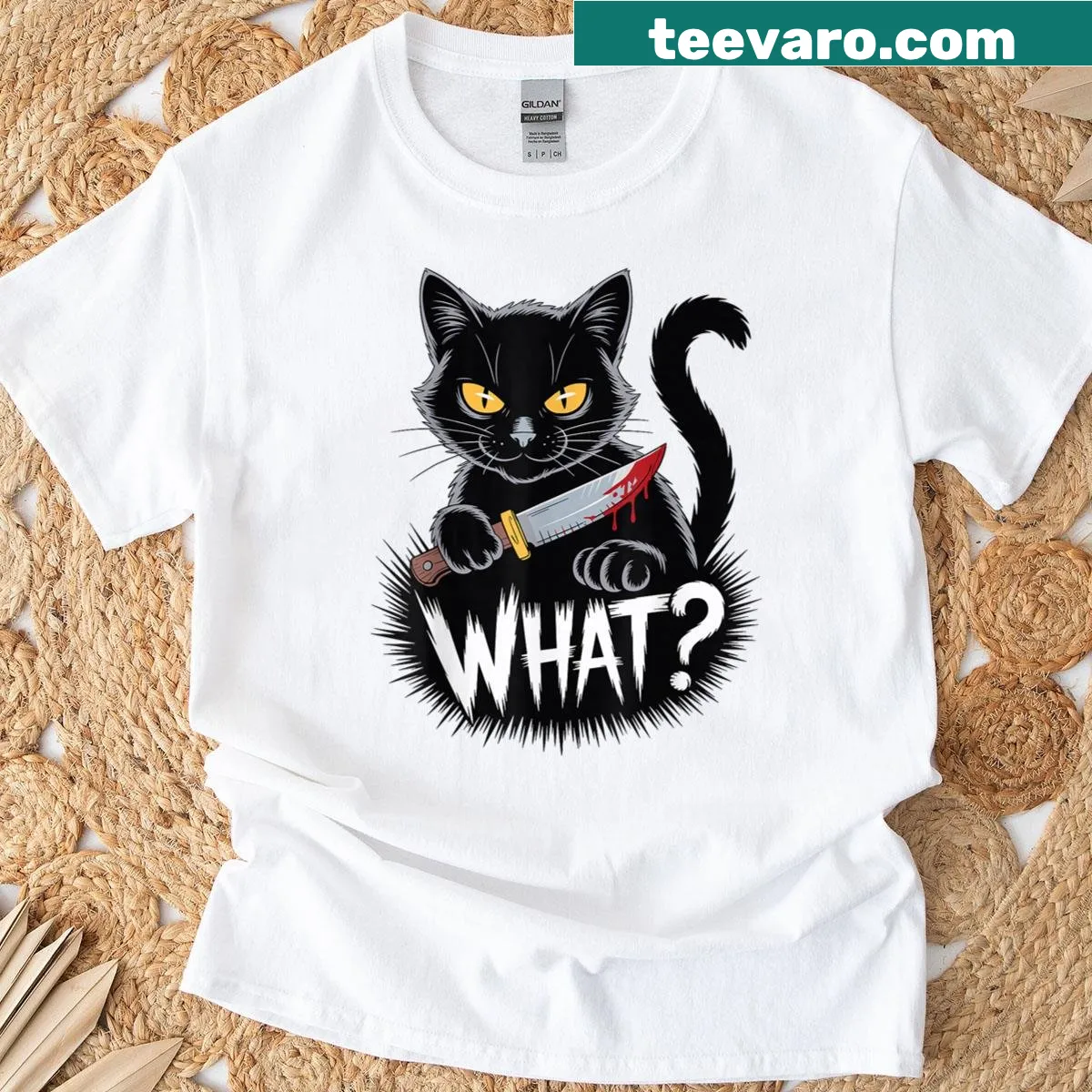 Funny Halloween T-shirt featuring a cartoon black cat with a knife — on a men's t-shirt